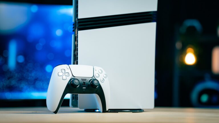 A video game console sitting on top of a wooden table